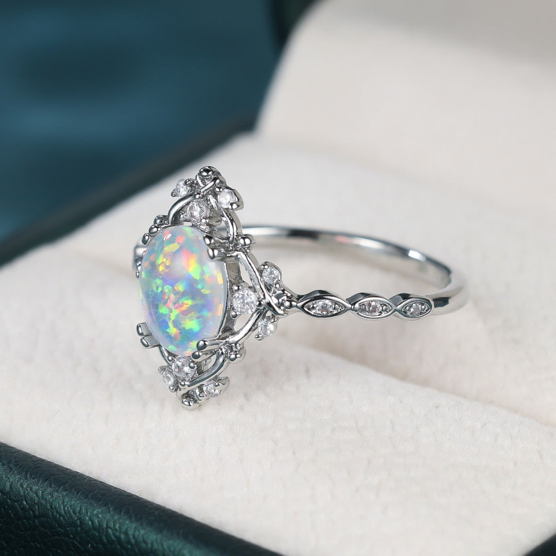 Oval Opal and Zircon Halo Everyday Ring