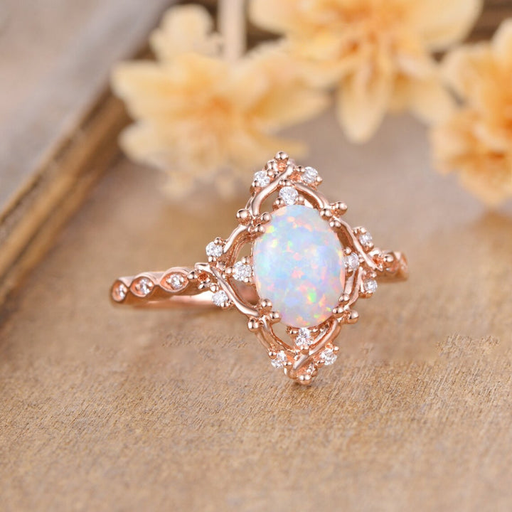 Oval Opal and Zircon Halo Everyday Ring