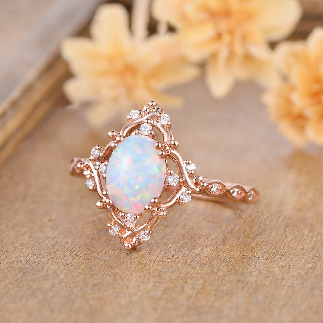 Oval Opal and Zircon Halo Everyday Ring