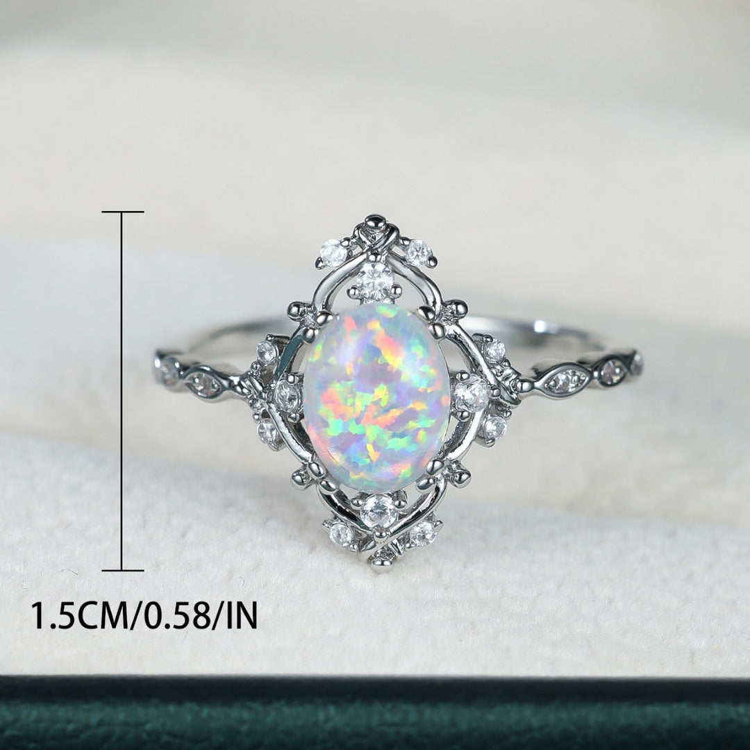 Oval Opal and Zircon Halo Everyday Ring