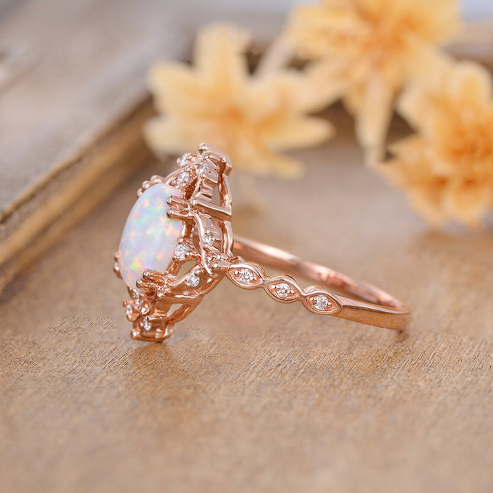 Oval Opal and Zircon Halo Everyday Ring