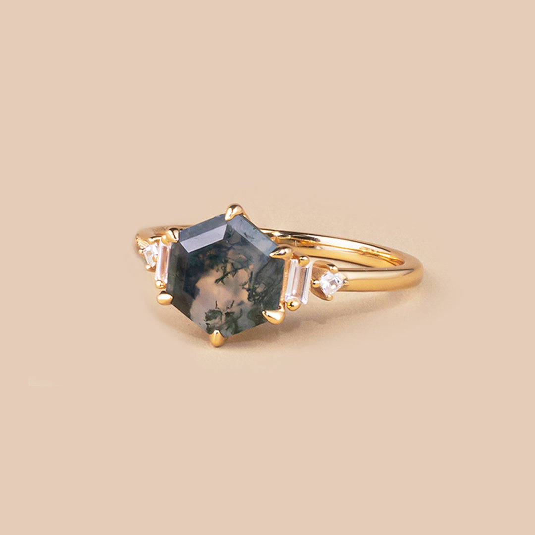 Uniquely shaped moss agate ring