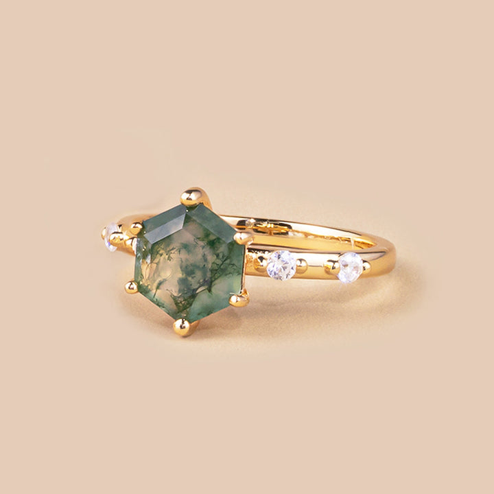Uniquely shaped moss agate ring