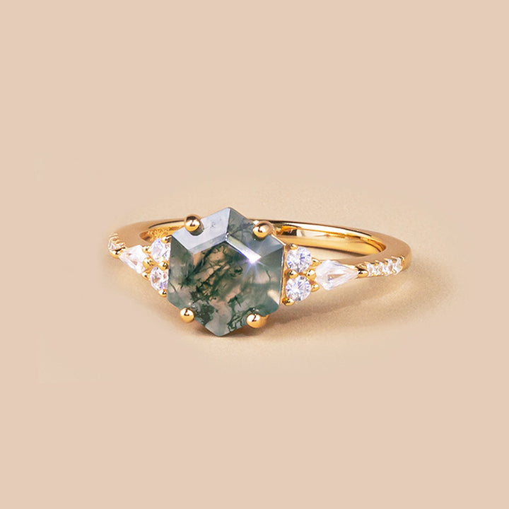 Uniquely shaped moss agate ring