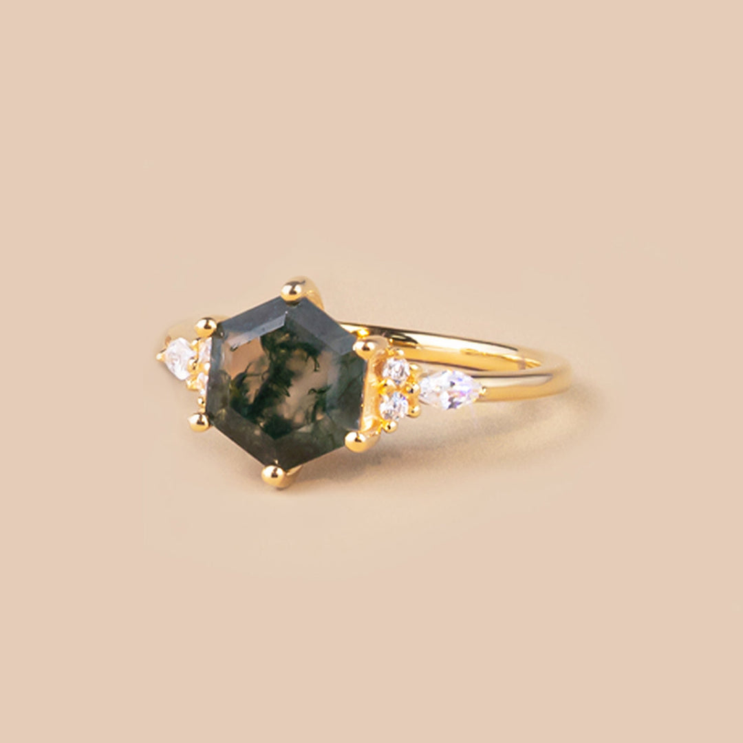 Uniquely shaped moss agate ring