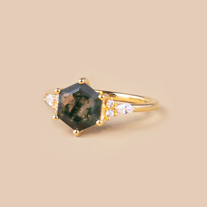 Uniquely shaped moss agate ring