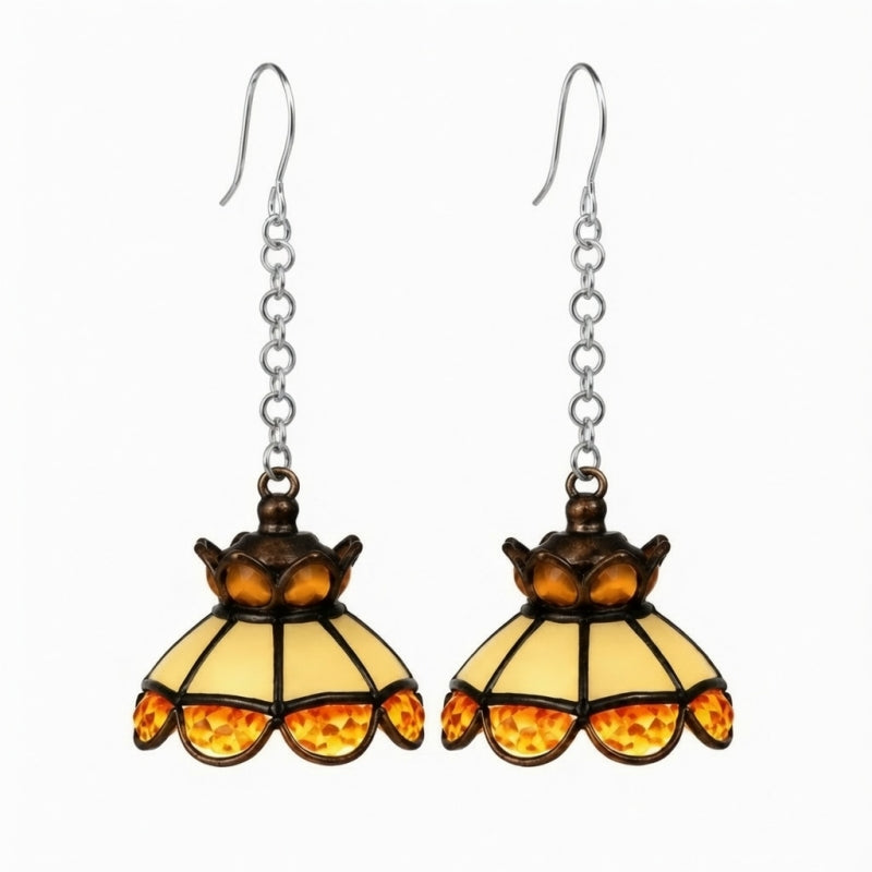 Amber vintage chandelier earrings on a light background